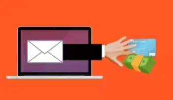Email envelope on computer screen with hand reaching through screen to steal cash and personal information in email spoofing scam